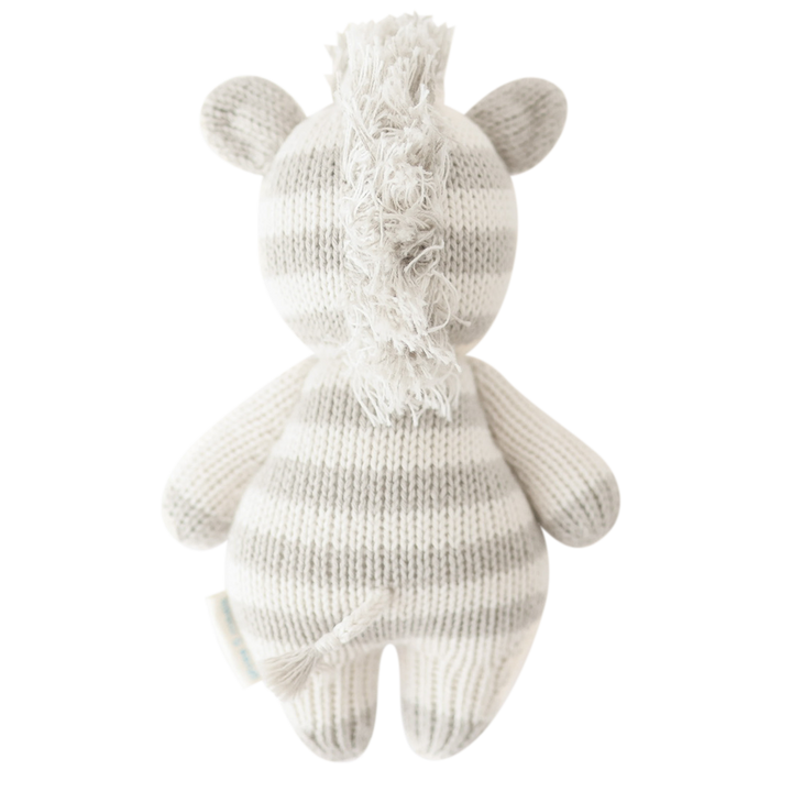 Flat image of the back of Cuddle+Kind&