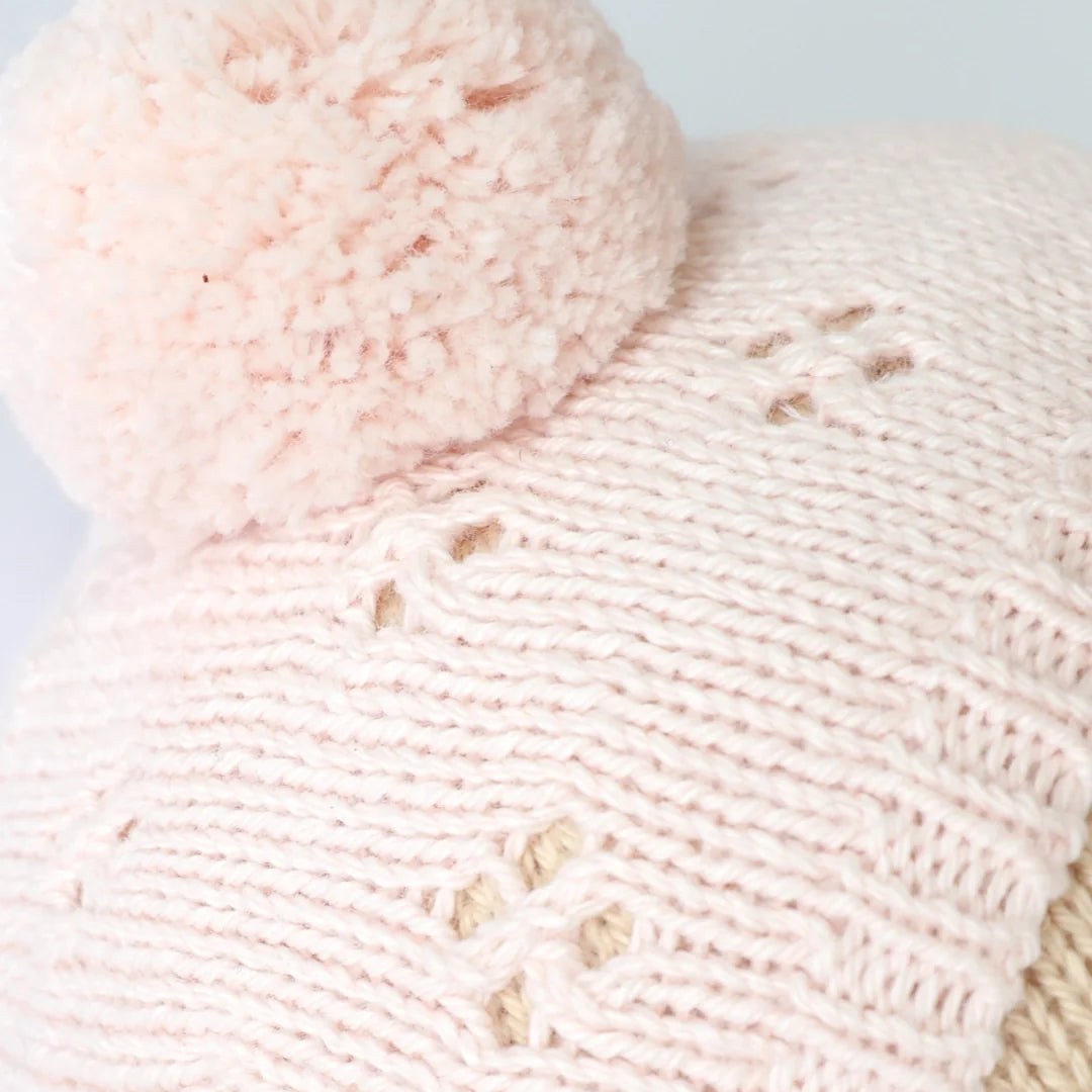 Close up image of the hat worn by Cuddle+Kind&