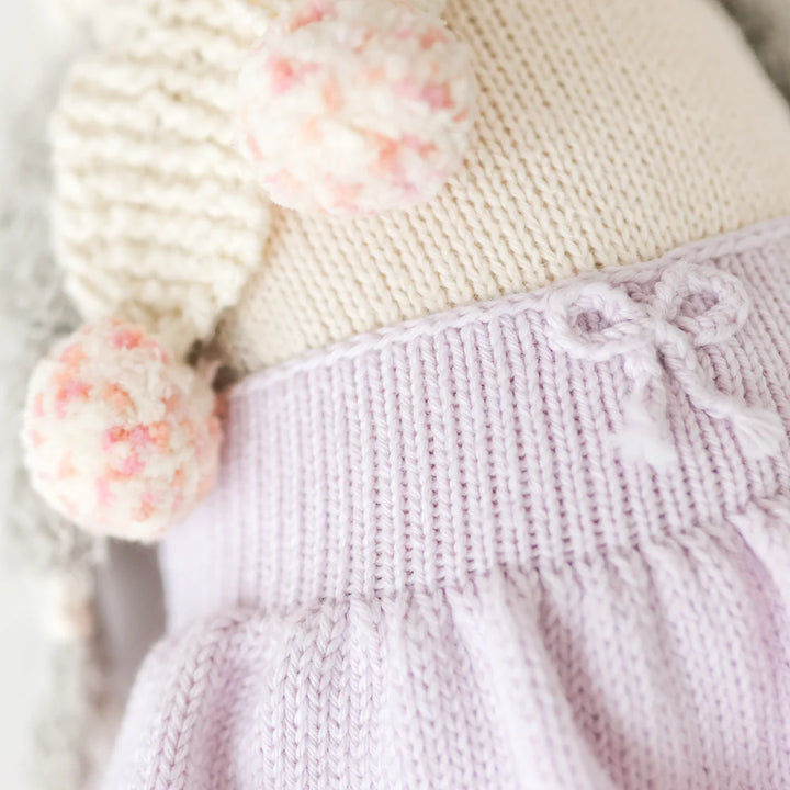 Close up shot of the purple skirt worn by Cuddle and Kind&