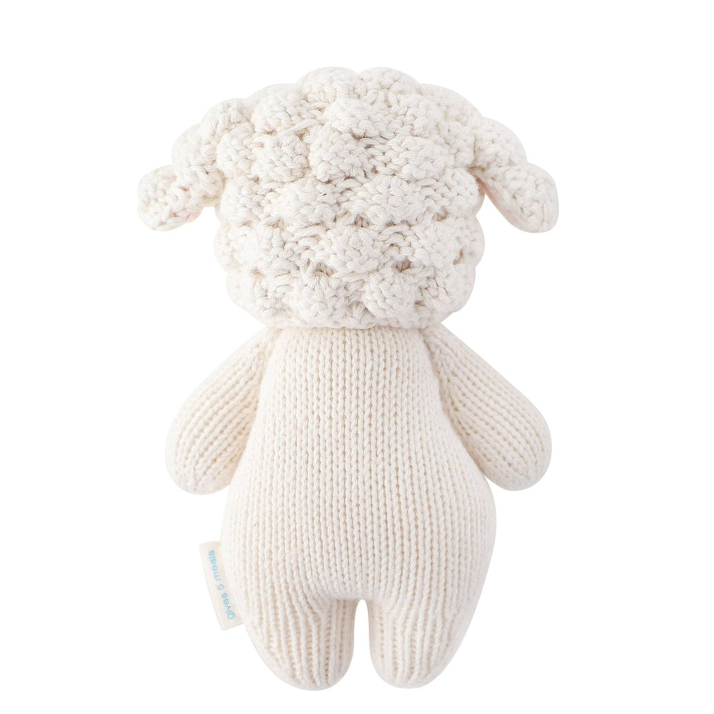 Flat image of the back of Cuddle+Kind's Baby Lamb on a clean white background