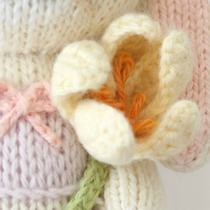Detail shot of the flower being held by Cuddle+Kind&