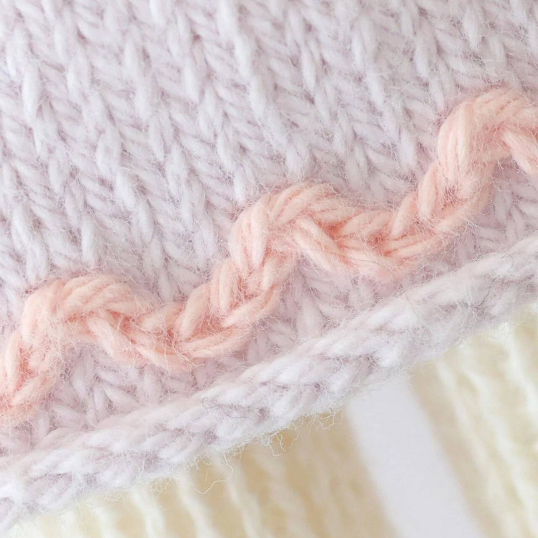 Detail shot of the dress skirt worn by Cuddle+Kind&