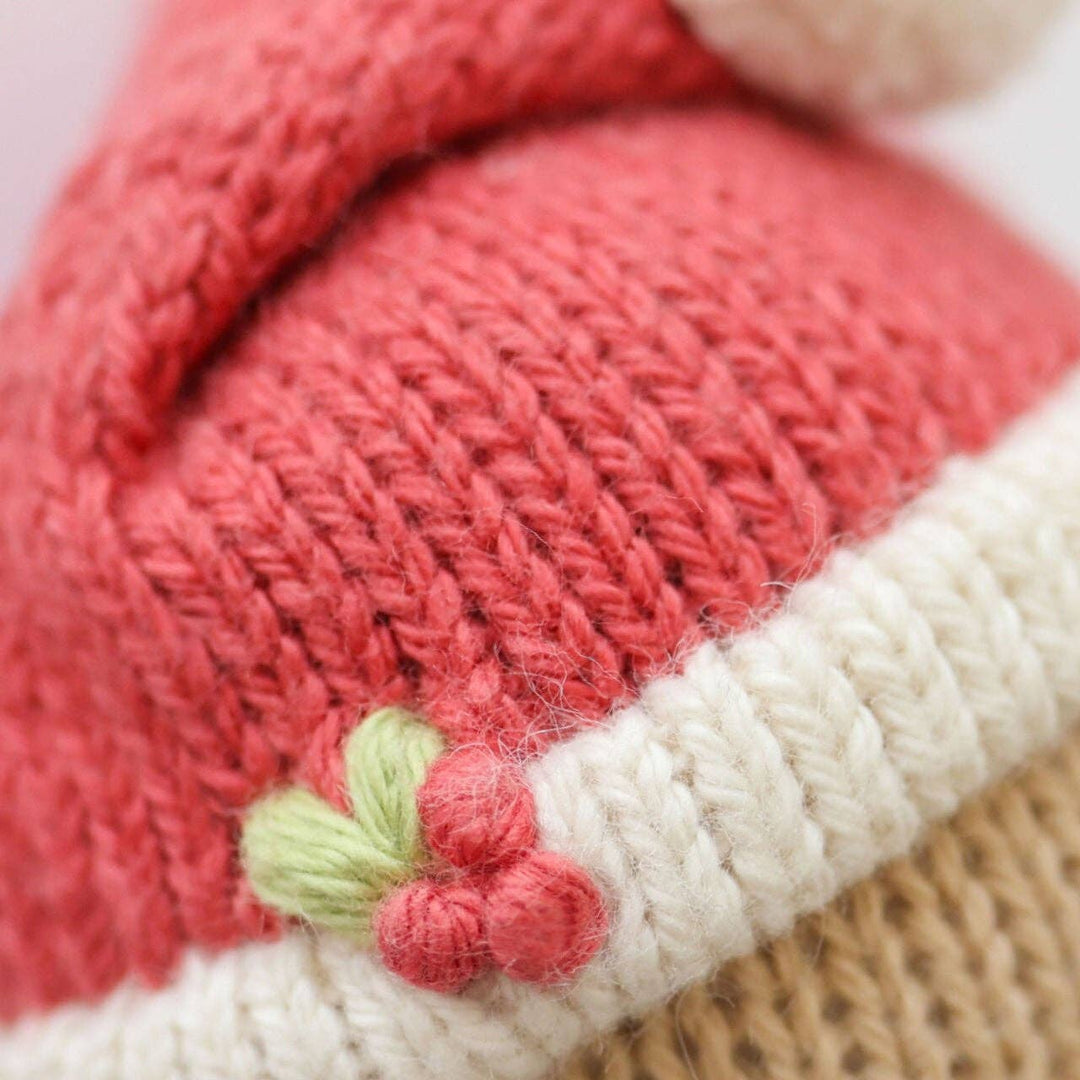 A close up shop of the mistletoe details on Cuddle+Kind&