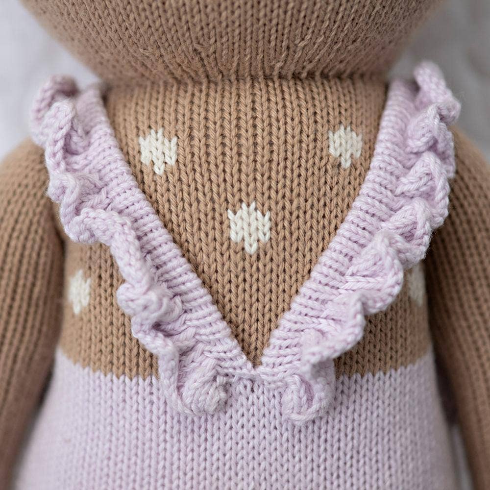Image of the dress strap detailing on the back of Cuddle+Kind&