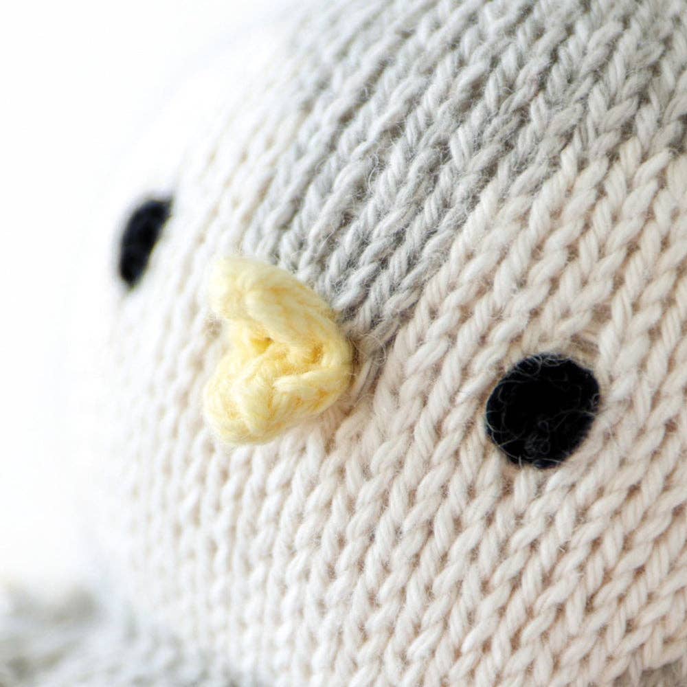 Close up image on the face of Cuddle+Kind&