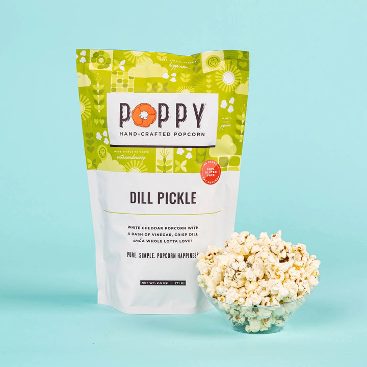 Poppy Dill Pickle Hand-Crafted Popcorn with a bowl of seasoned popcorn