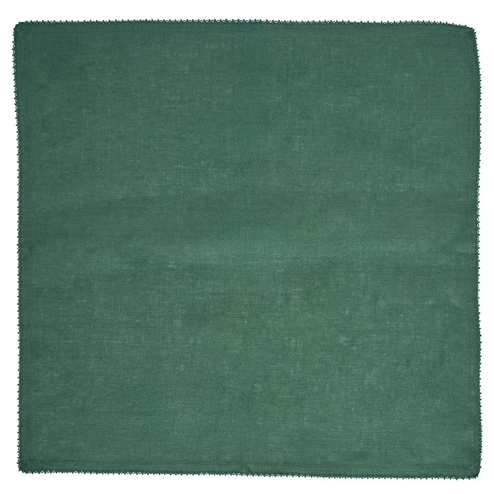 Forest green linen napkin by Juliska featuring a solid evergreen color and delicate decorative trim along the edges.