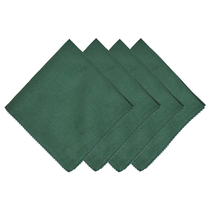 Set of four forest green linen napkins with decorative edge trim for elegant dining and holiday table settings.