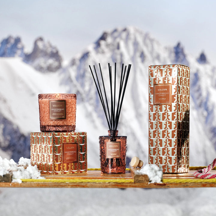 Gingerbread Chalet Reed Diffuser displayed with coordinating Voluspa Gingerbread Chalet candle and holiday packaging