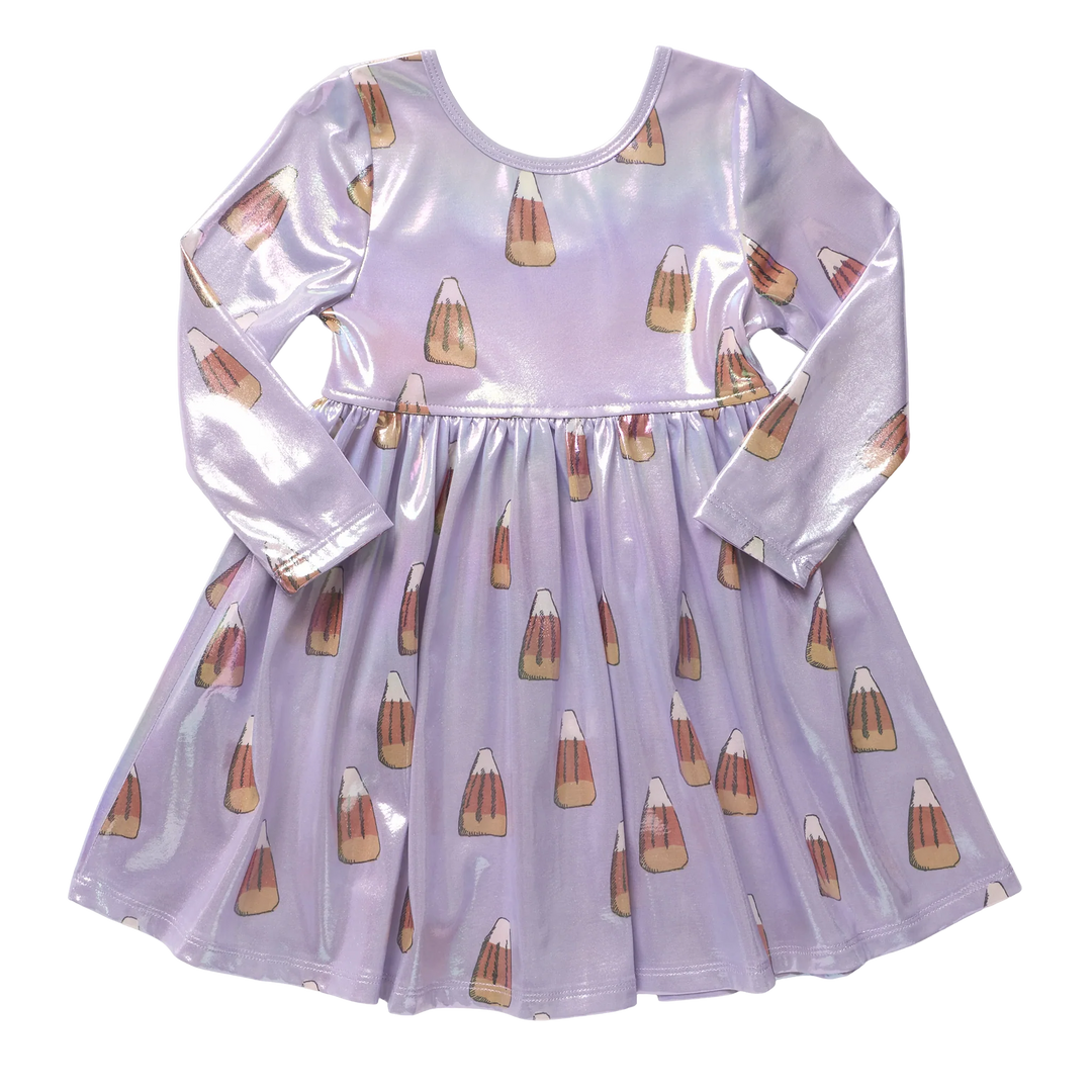 Front view of girls iridescent lavender candy corn dress with long sleeves, round neckline, gathered waist, and Halloween candy corn print.