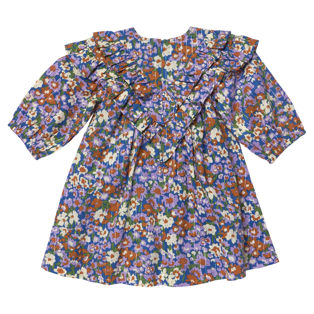 Back view of Girls Everly Dress True Blue Sketched Floral with layered shoulder ruffles and flowy silhouette