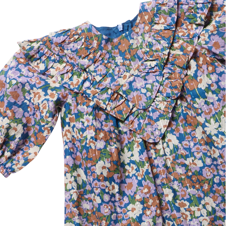 Close-up of Girls Everly Dress True Blue Sketched Floral showing layered ruffles and metallic stripe detail