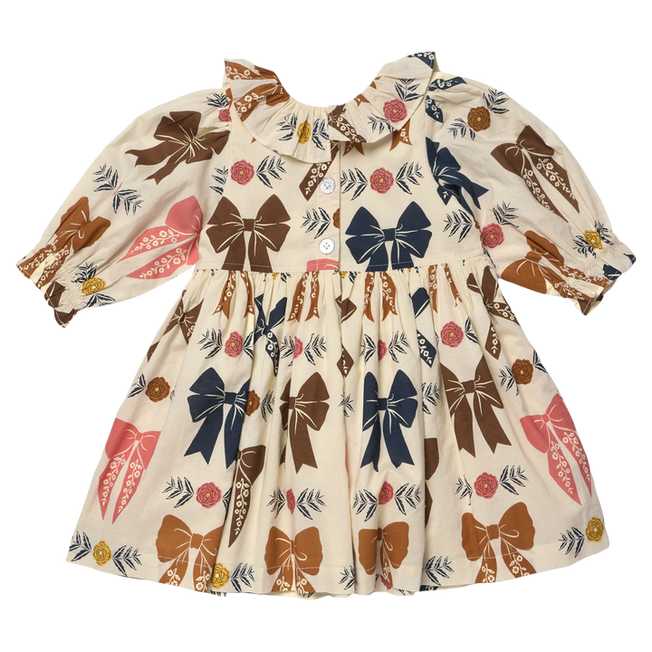 Back view of Girls Harvest Bow Dress with button closure, gathered skirt and colorful bow print