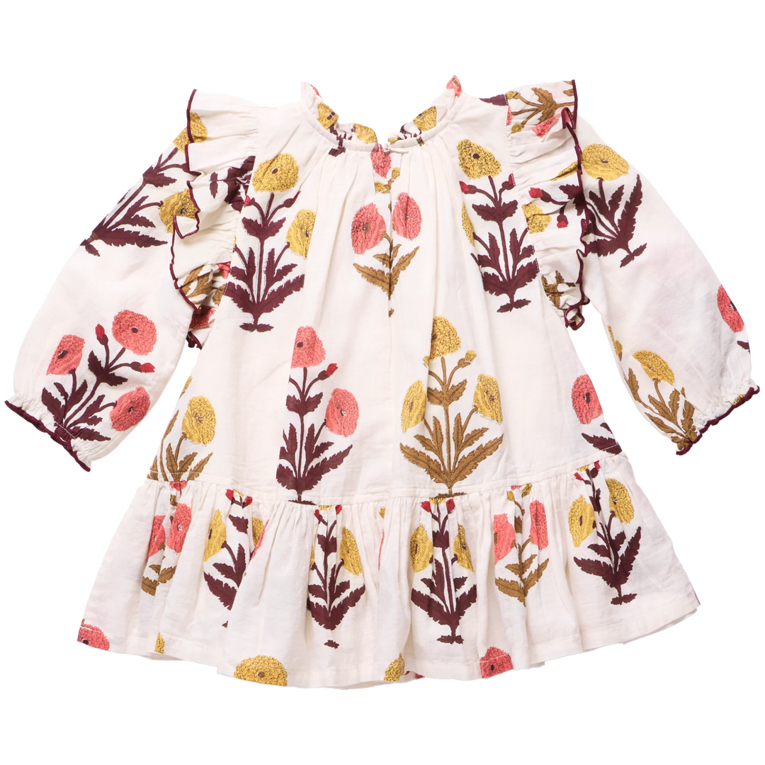 Back view of Girls Harvest Dandelion Dress featuring long sleeves and gathered ruffle hem
