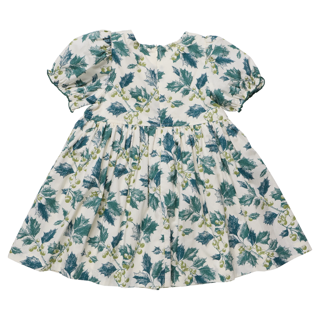 Girls Hermione Dress in Green Holly by Pink Chicken featuring a festive holiday print