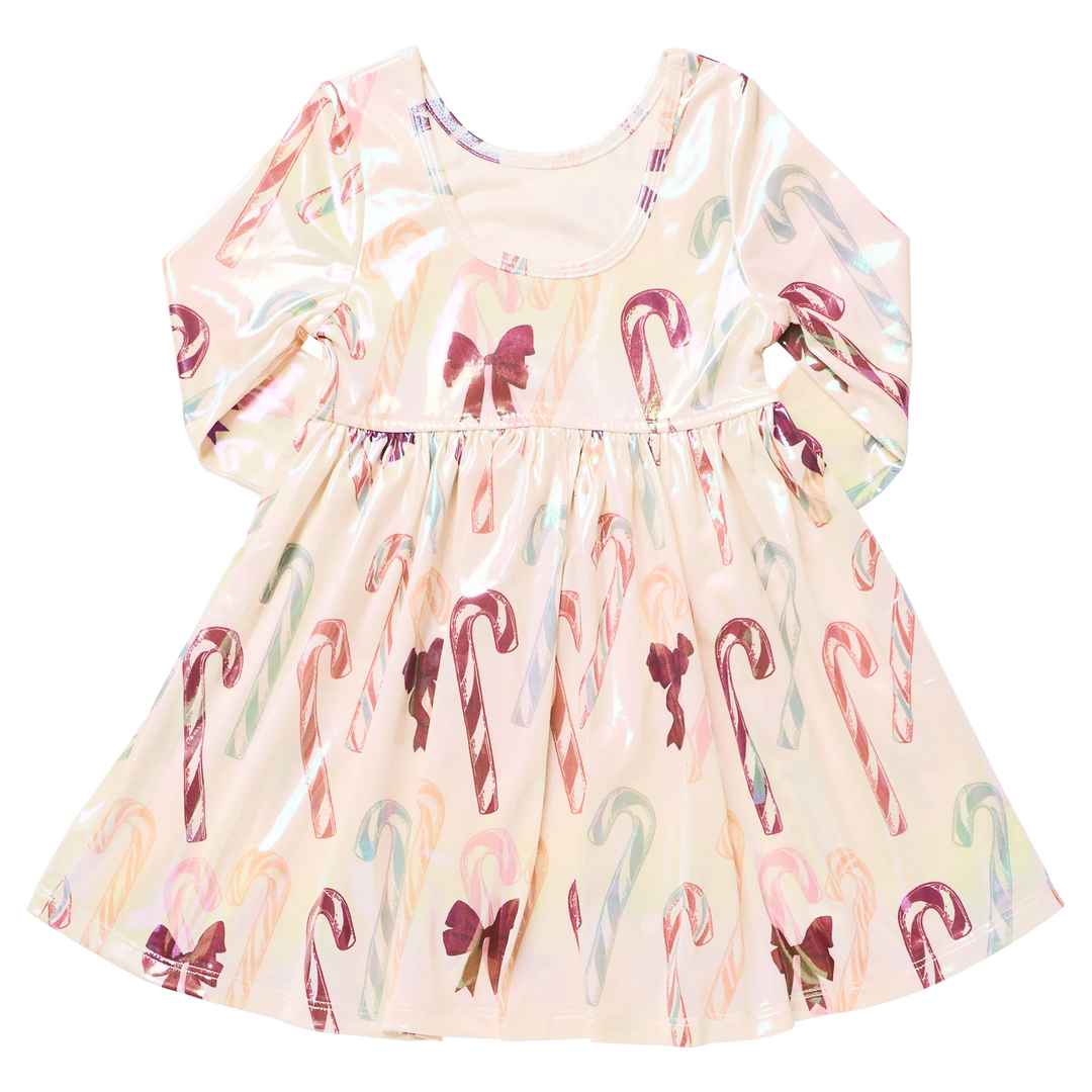 Back view of Pink Chicken Girls Lame Steph Dress in Antique Candy Canes featuring a scoop neckline, long sleeves, gathered skirt, and iridescent holiday print.