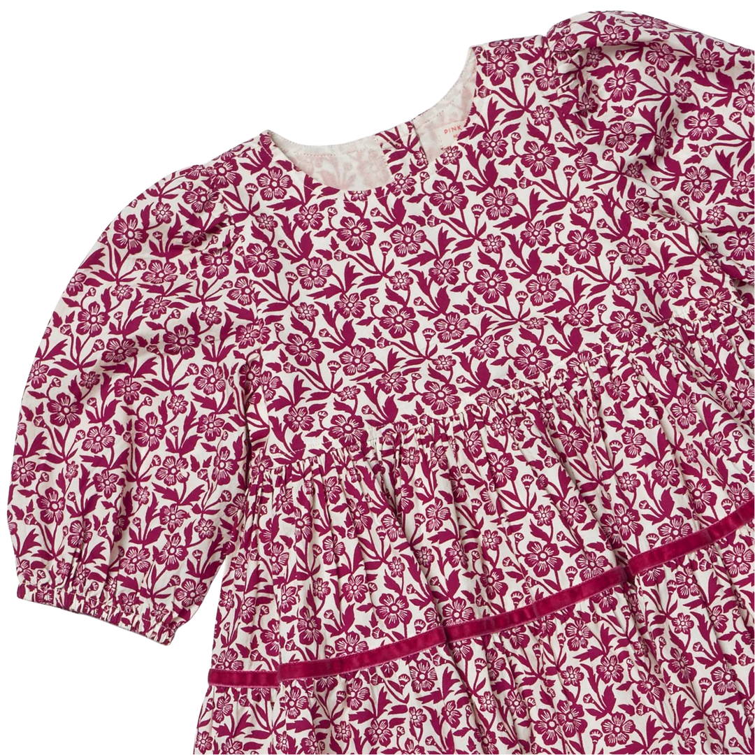 Close-up of Girls Maribelle Dress showing burgundy climbing floral print, gathered waist and velvet trim