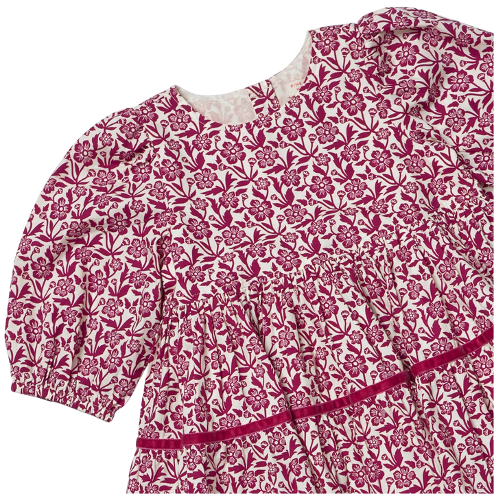 Close-up of Girls Maribelle Dress showing burgundy climbing floral print, gathered waist and velvet trim
