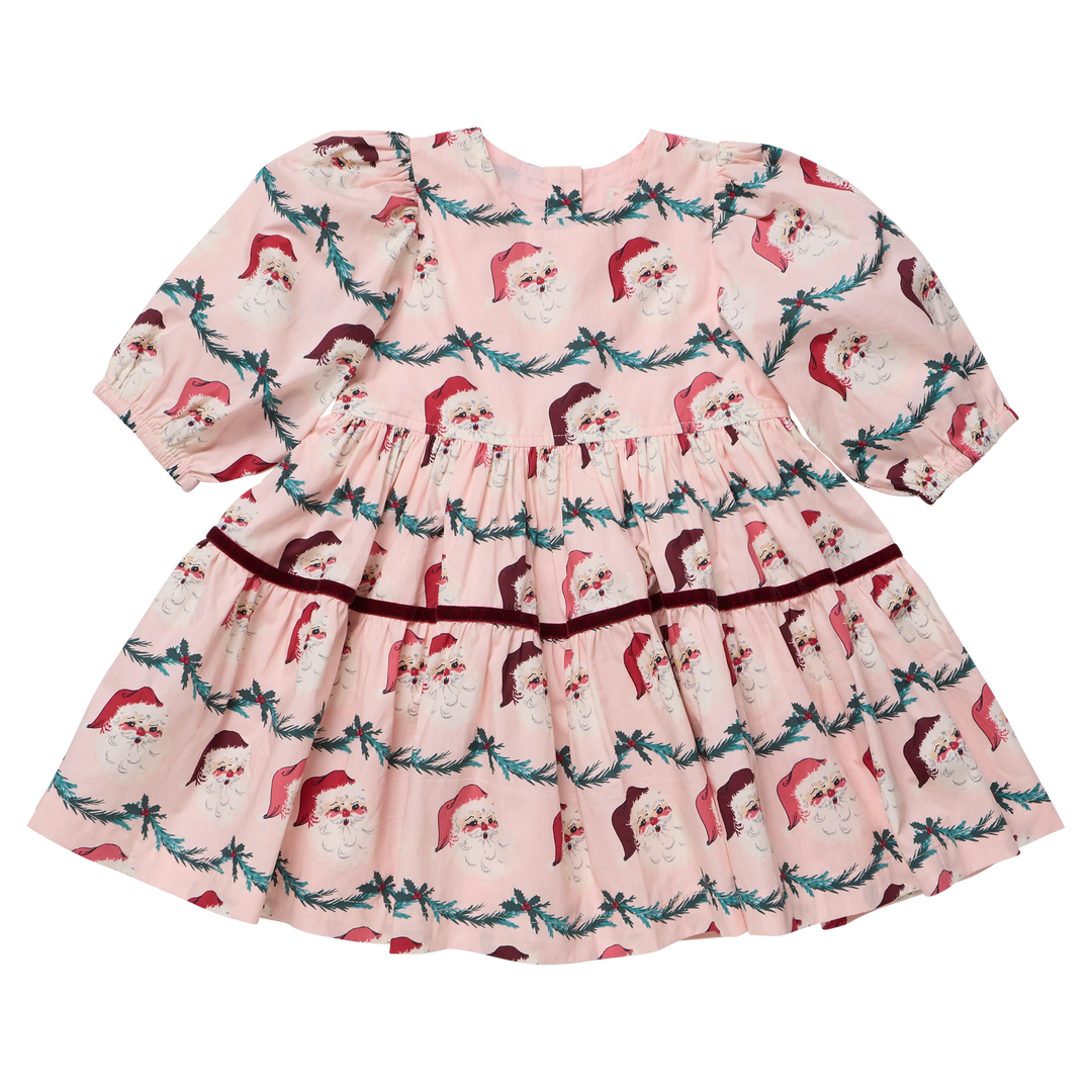 Pink Chicken Girls Maribelle Dress in Santa Garland featuring a pink vintage Santa print, puff sleeves, tiered skirt, and burgundy velvet trim.