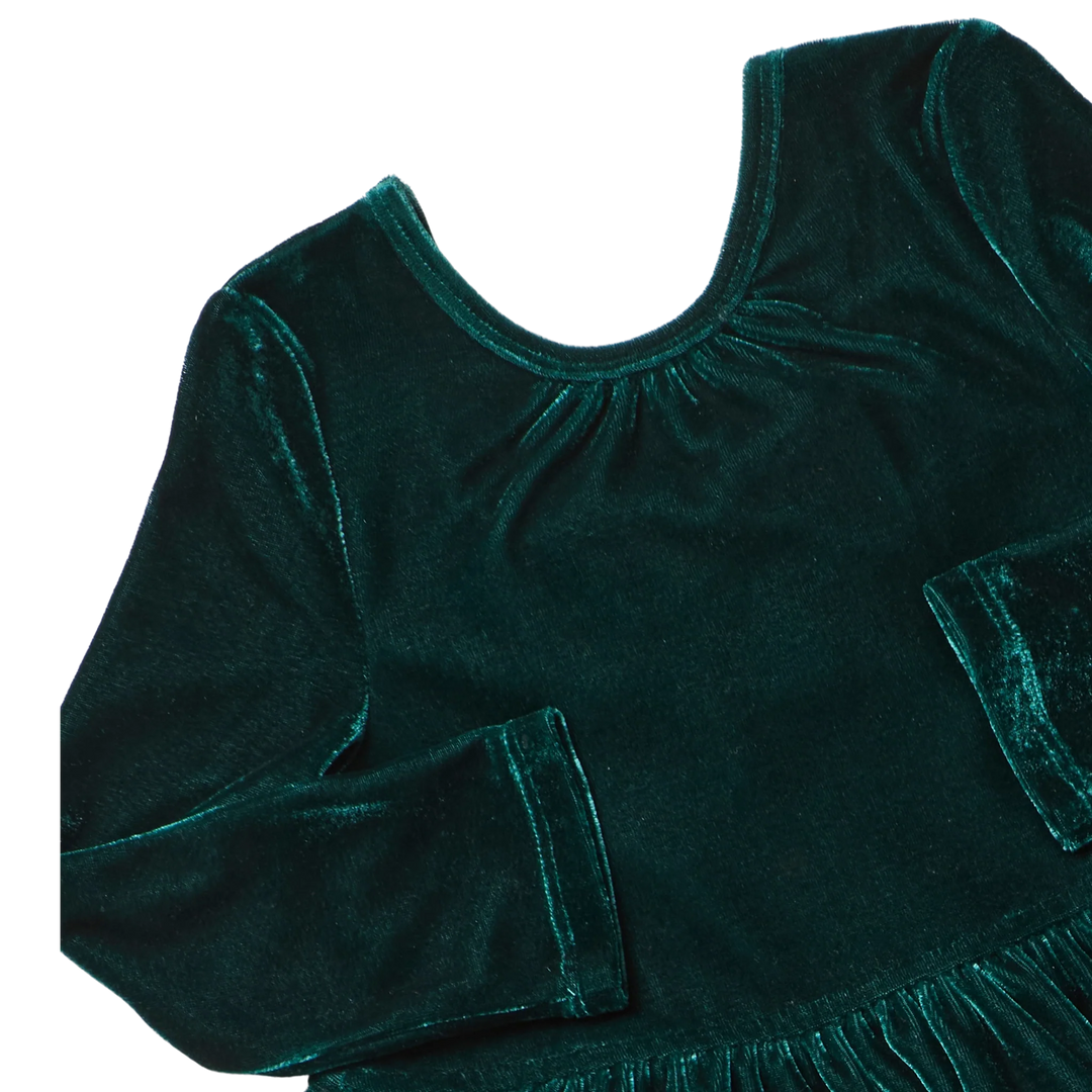Close-up of Girls Pearl Dress showing luxurious evergreen velour fabric, gathered round neckline, and long sleeves