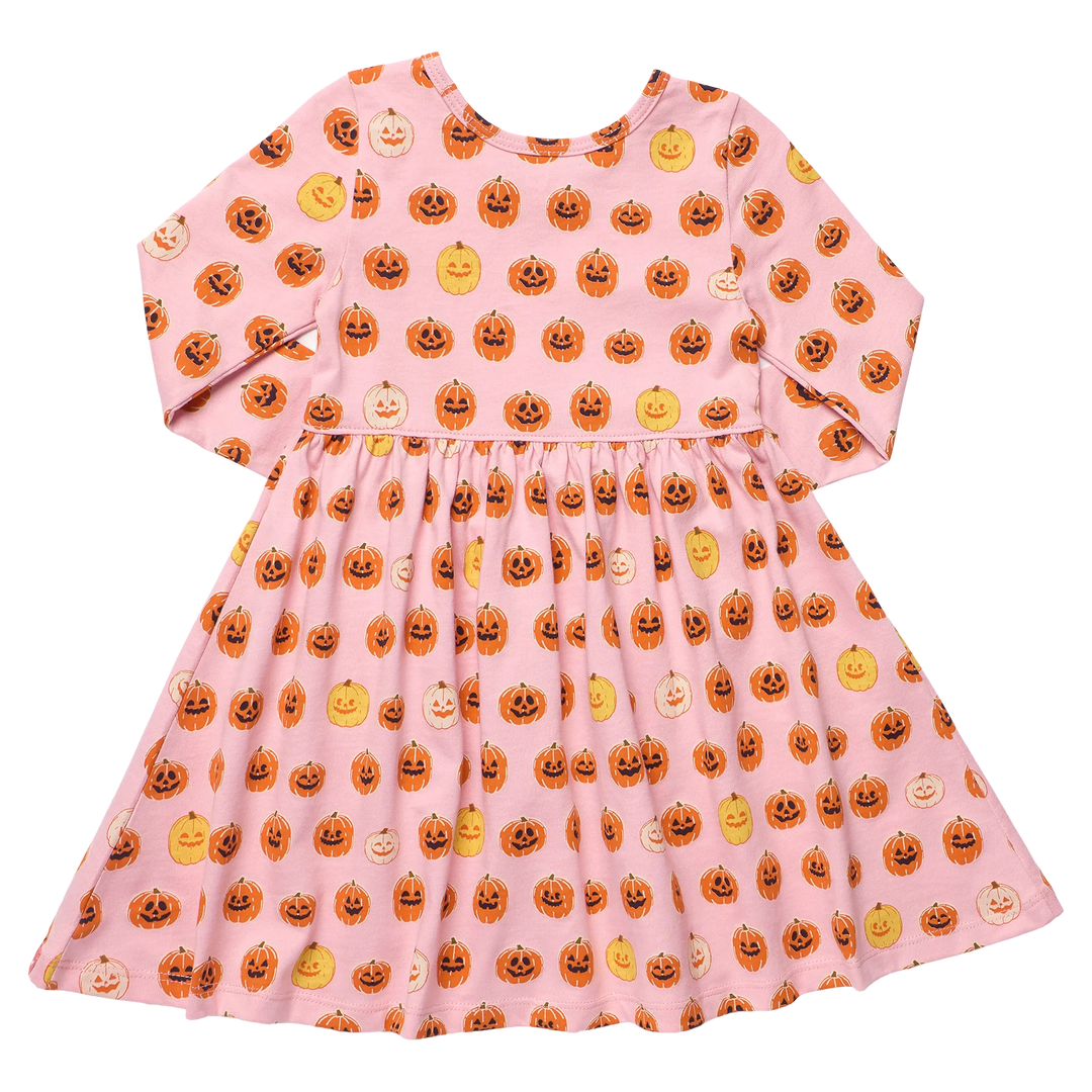 Back view of pink girls pumpkin Halloween dress featuring an allover orange jack-o&