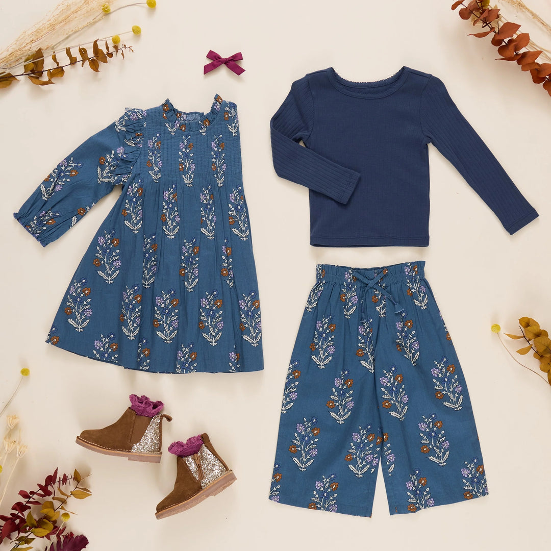 Girls Theodore Pant in Balsam Dewdrop styled with coordinating blue top, floral dress and fall accessories