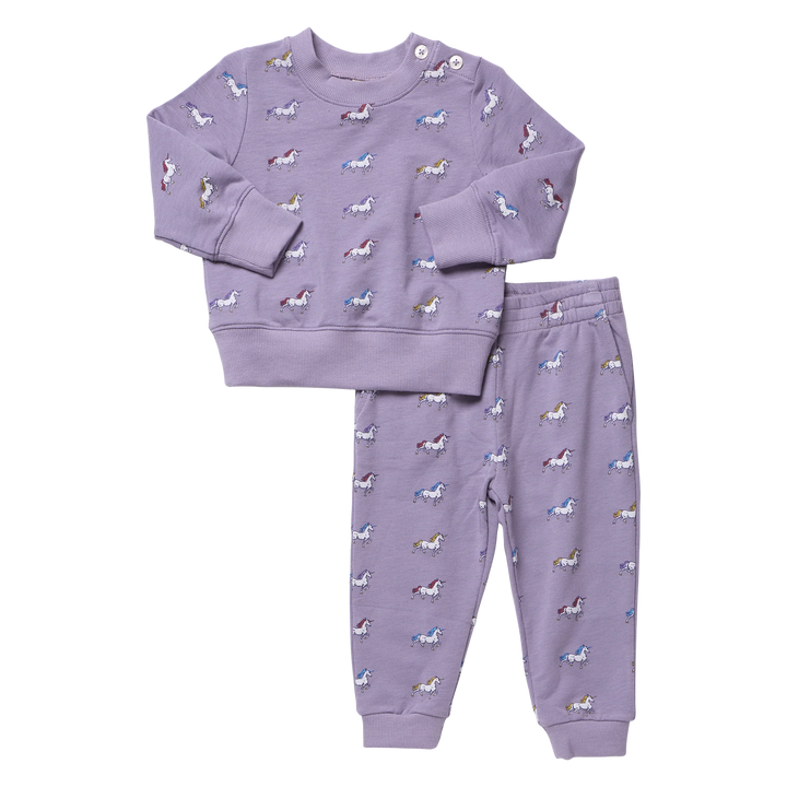Girls purple unicorn jogger set featuring a long sleeve sweatshirt with shoulder buttons and matching unicorn print jogger pants.