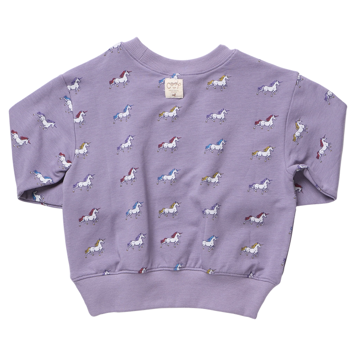 Back view of girls lavender unicorn sweatshirt with all-over colorful unicorn print and ribbed hem