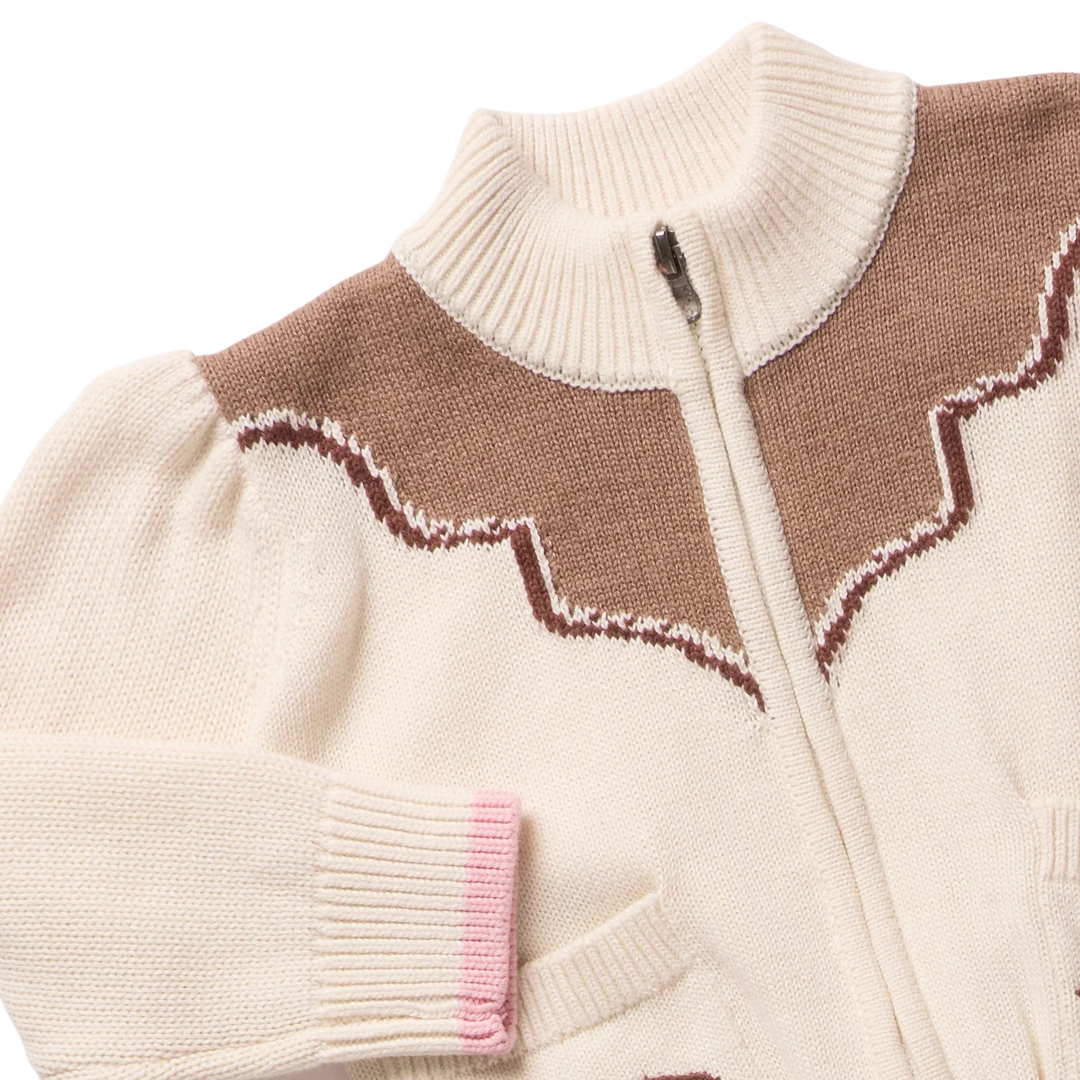 Close-up of Girls Western Sweater featuring brown western yoke design, ribbed collar and pink cuff trim