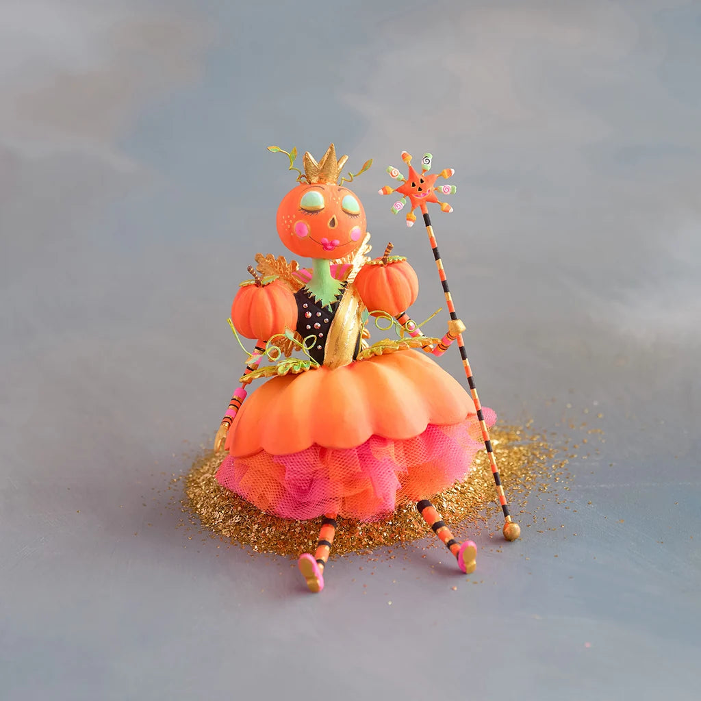 Glitterville Fairy Gourdmother Halloween ornament featuring a pumpkin-inspired fairy with a crown, pink tulle skirt, pumpkins, and a whimsical candy-striped wand.