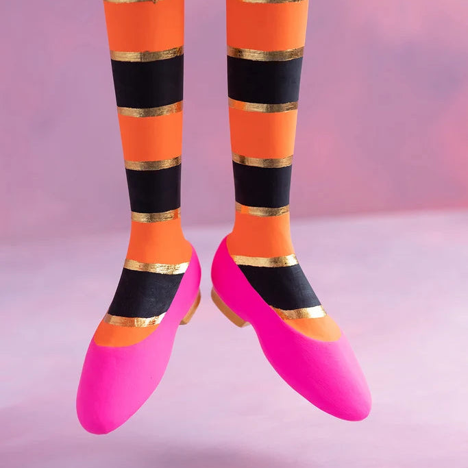 Glitterville Fairy Gourdmother large display close-up showing orange and black striped legs with gold accents and bright pink shoes.