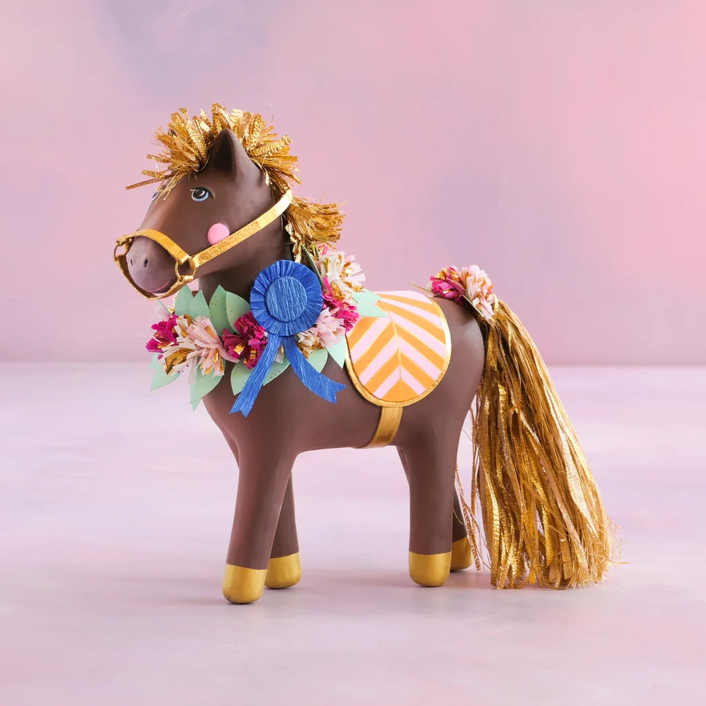 Glitterville Gallop the Horse smaller tabletop display featuring a brown decorative horse with a gold mane and tail, floral garland, blue ribbon, and pink and yellow saddle.
