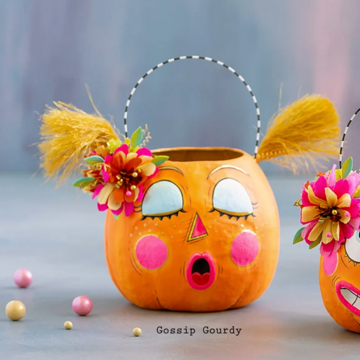 Glitterville Gossip Gourdy pumpkin buckets featuring a playful face, colorful floral accents, and whimsical Halloween details.