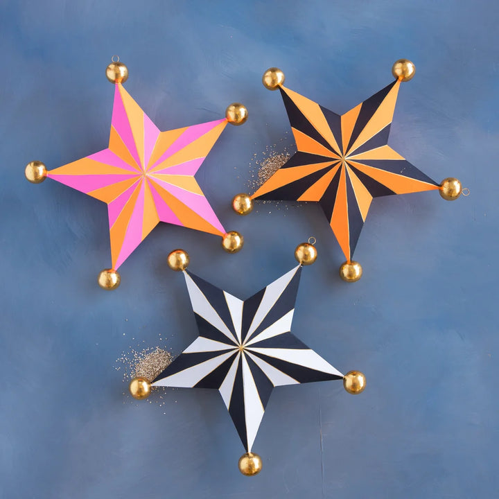 Glitterville Halloween Stripe Star Set small size featuring orange and black, black and white, and pink and orange striped stars with gold ball accents.