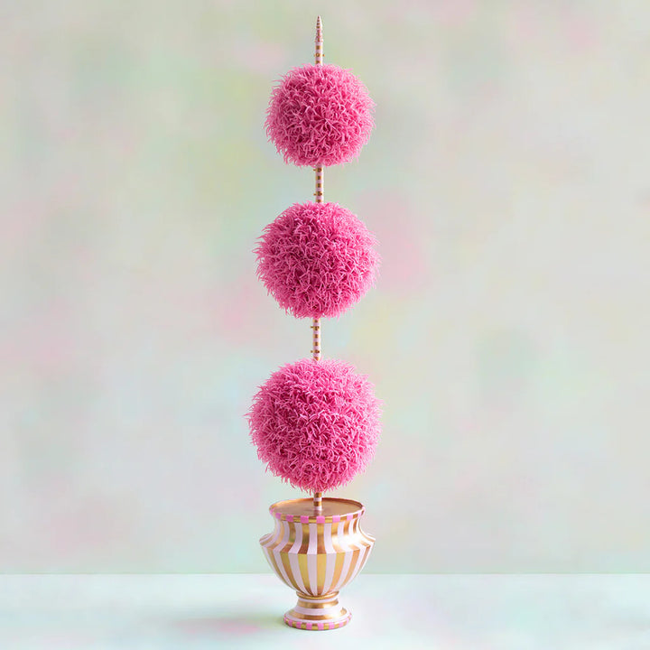 Glitterville large pink ball topiary with three fluffy pink spheres on a gold-accented stem, displayed in a decorative gold and light pink striped pedestal pot.