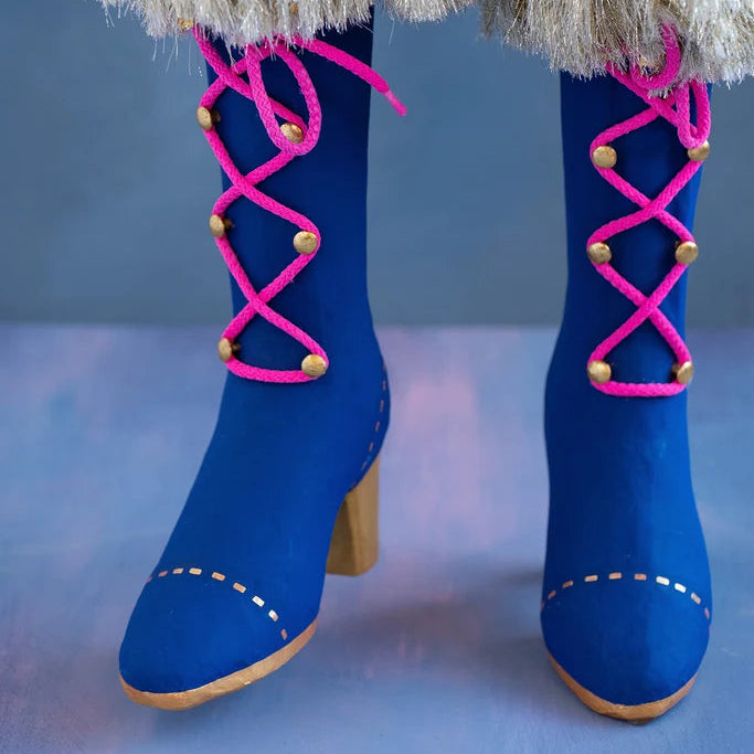 Close-up detail of Glitterville Pinky Itchy Witchy showing her blue boots complete with pink cross lacing and a fur top.