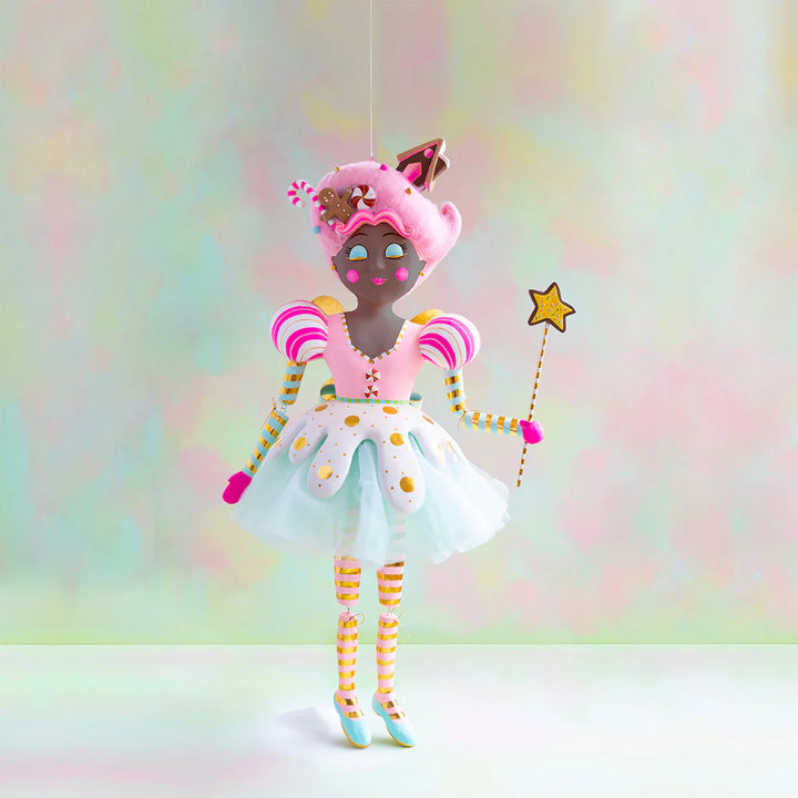 Large Glitterville Sugar Plum Fairy display figure with cool black skin, pink candy-inspired hair decorated with gingerbread and peppermint accents, a pastel pink and white dress with gold details, striped sleeves and legs, mint shoes, and a star-tipped wand.