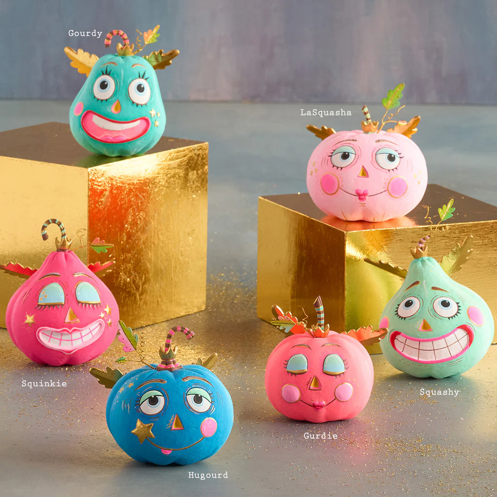 Glitterville Tabletop Pumpkin Pixies collection labeled with the names Gourdy, LaSquasha, Squinkie, Hugourd, Gurdie, and Squashy.