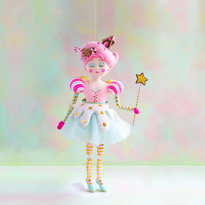 Large Glitterville White Sugar Plum Fairy display figure wearing a pastel pink and white candy-inspired dress with gold accents, striped sleeves and legs, a whimsical candy-adorned hairstyle, and holding a star-tipped wand.