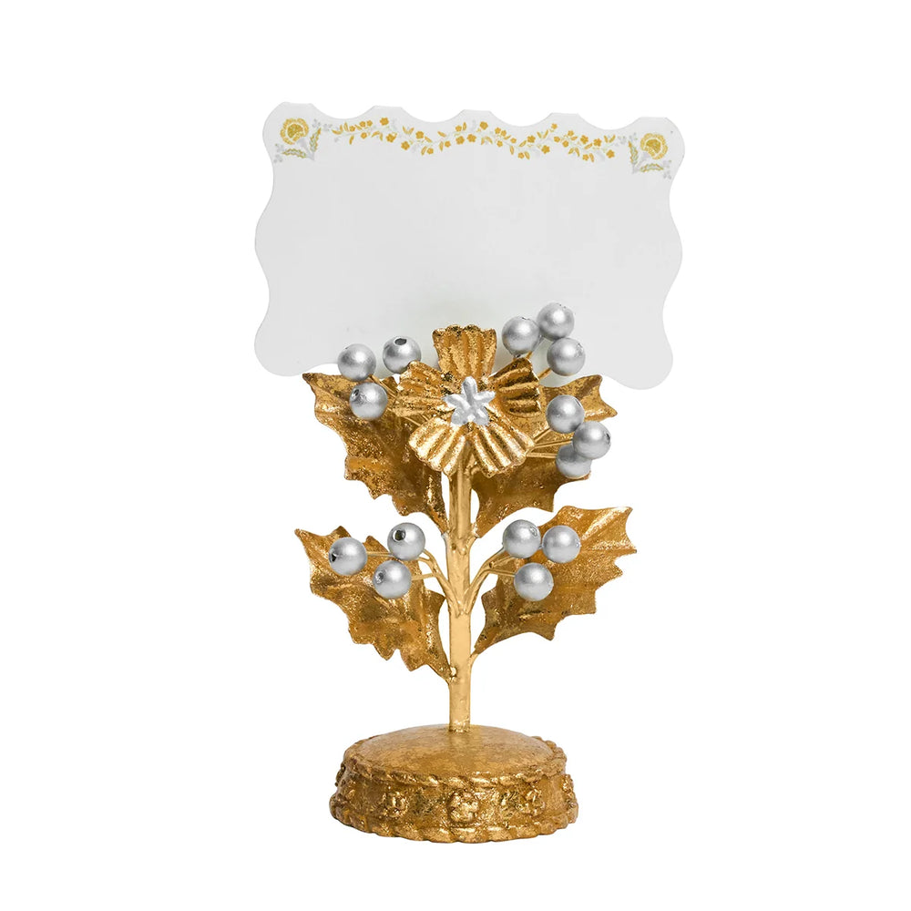 Gold holly leaf and silver berry place card holder with a decorative blank name card, perfect for Christmas and holiday table settings.