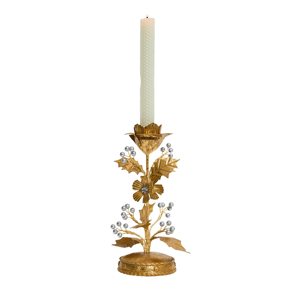 Gold Holly Taper Candle Holder with white taper candle, gold botanical details and silver berry accents