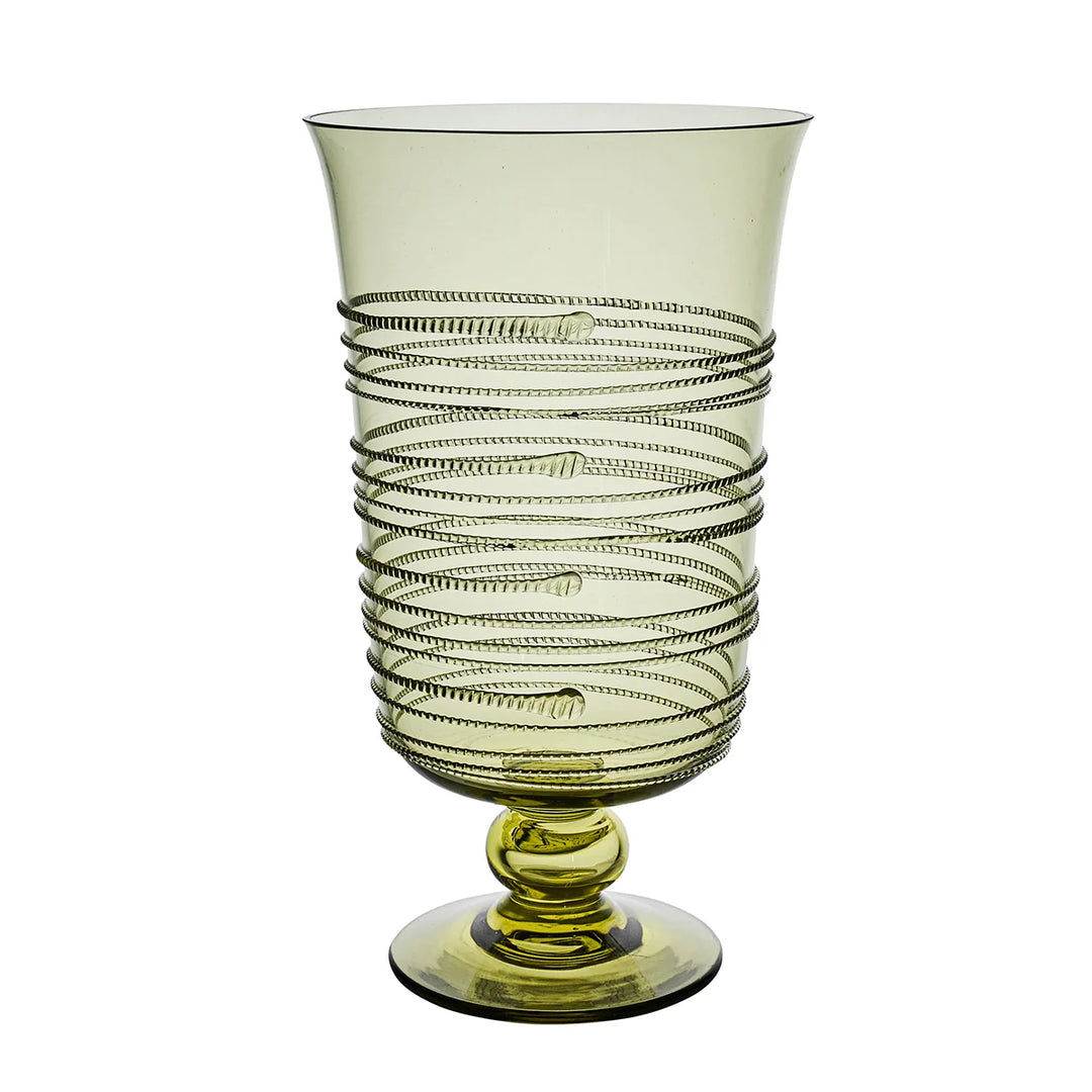 Green glass hurricane candle holder with raised wrapped thread detailing, pedestal base and flared rim.