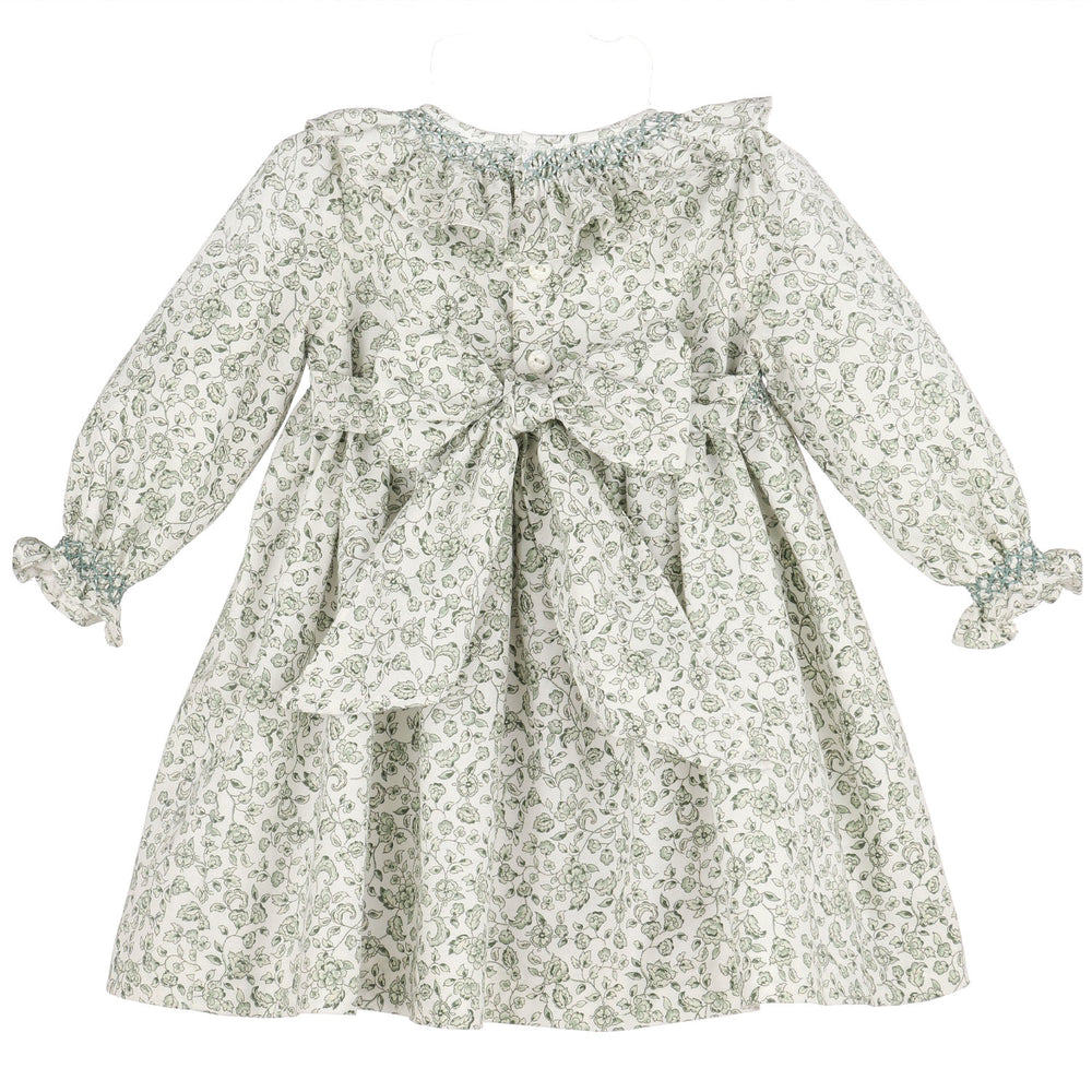 Back view of Green Heirloom Floral Smocked Dress featuring button closure, sash bow, and green floral print