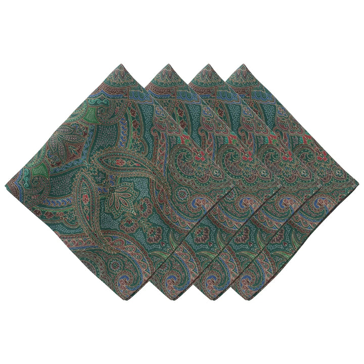 Set of four green paisley cloth napkins with intricate floral and scroll motifs in rich jewel-tone colors.