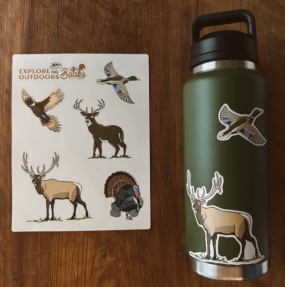 Hunting Weatherproof Sticker Sheet displayed beside a green water bottle decorated with mallard duck and elk weatherproof stickers.