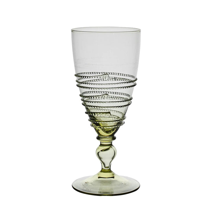Juliska Amalia green footed goblet featuring a pale green glass finish, decorative stem and handcrafted wrapped thread detailing.