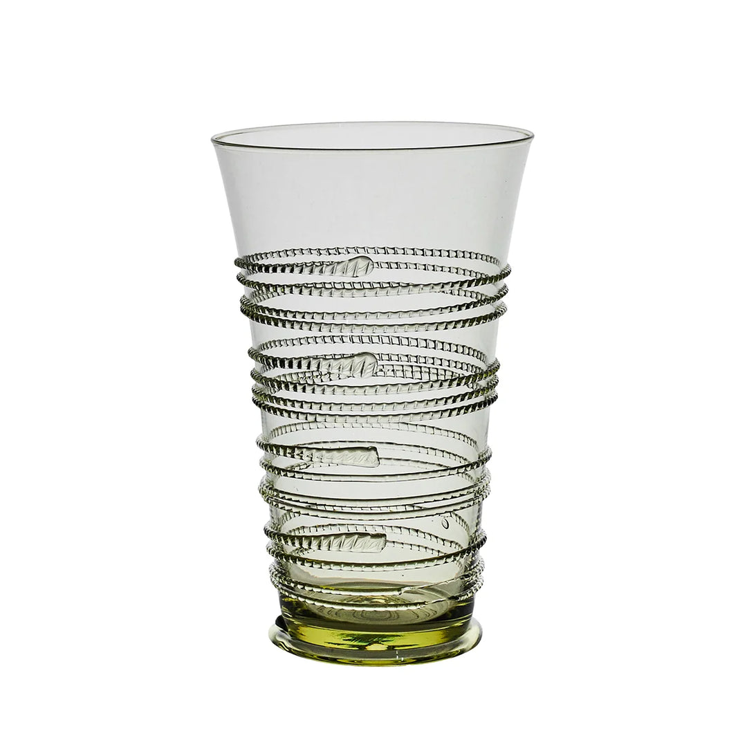 Juliska green glass highball tumbler featuring a tall flared silhouette and decorative wrapped glass thread detailing.