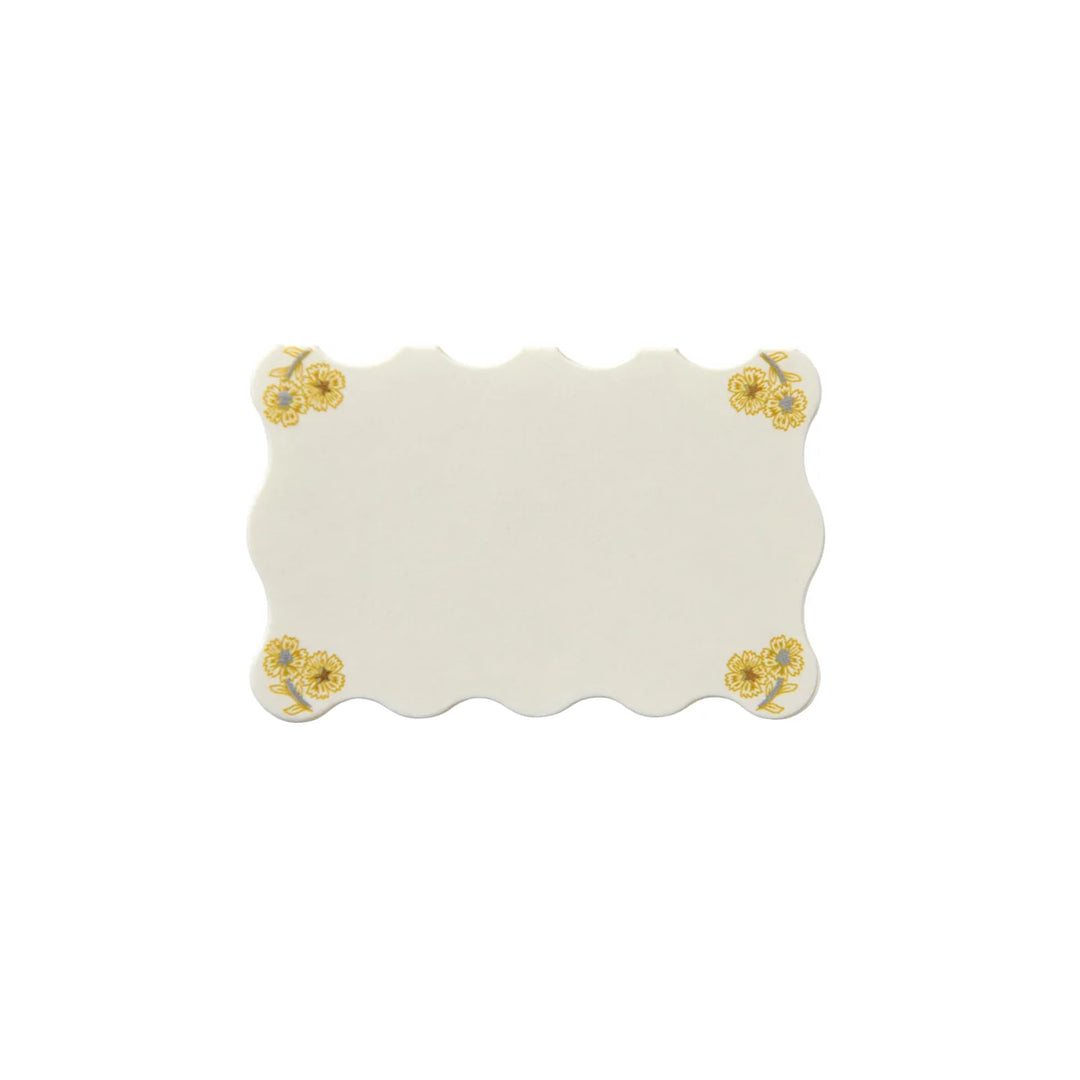 Juliska Holly place card with scalloped edges and gold floral designs in each corner