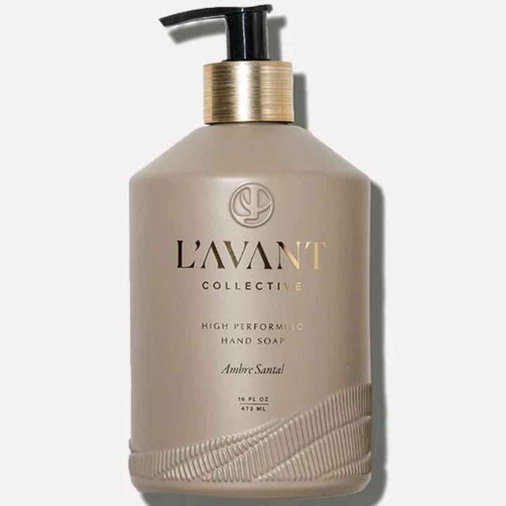 L’AVANT Collective Ambre Santal High Performing Hand Soap 16 oz taupe bottle with black pump and gold accents