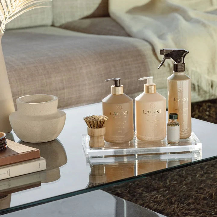 L’AVANT Ambre Santal Multipurpose Cleaner displayed with luxury home cleaning products on acrylic tray